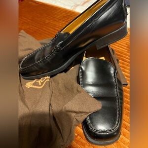 Tod’s Black Leather Loafers